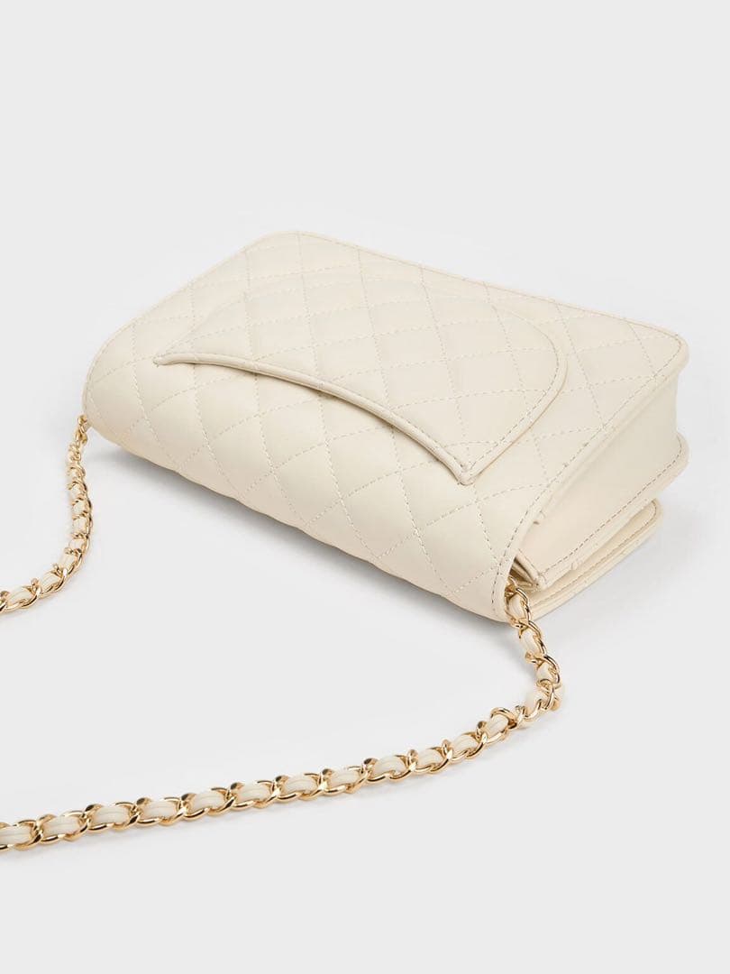 Cressida クレシダ キルトプッシュロッククラッチ - クリーム