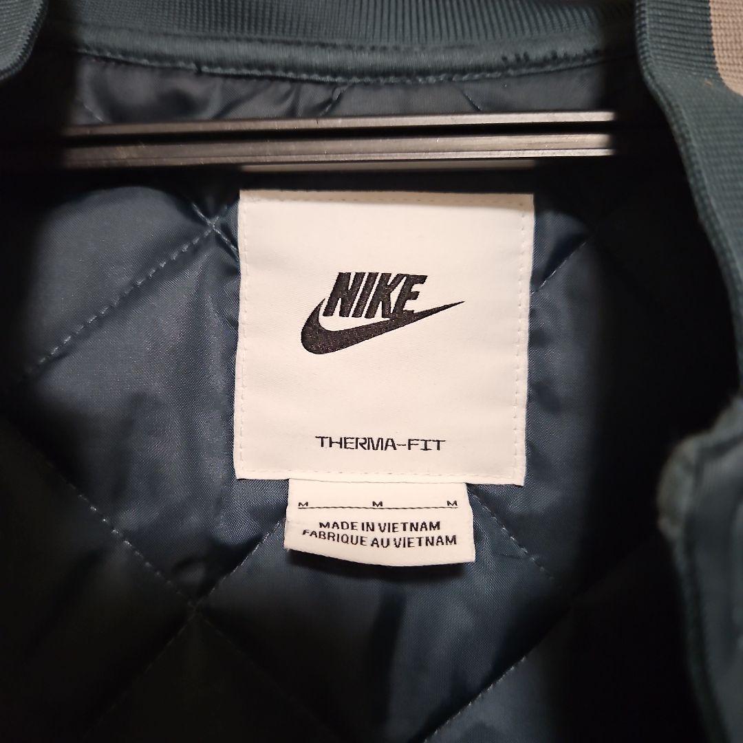 NIKE ダークグリーン　スタジャンMサイズ