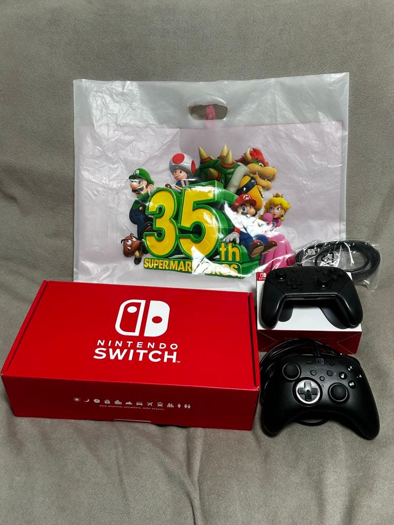Switch本体 Nintendo TOKYO限定　ネオンパープルネオンオレンジ