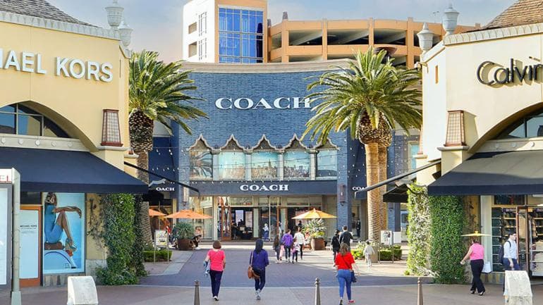 COACH コーチシグネチャー ファスナーリストウォレット長財布/パウダーピンク
