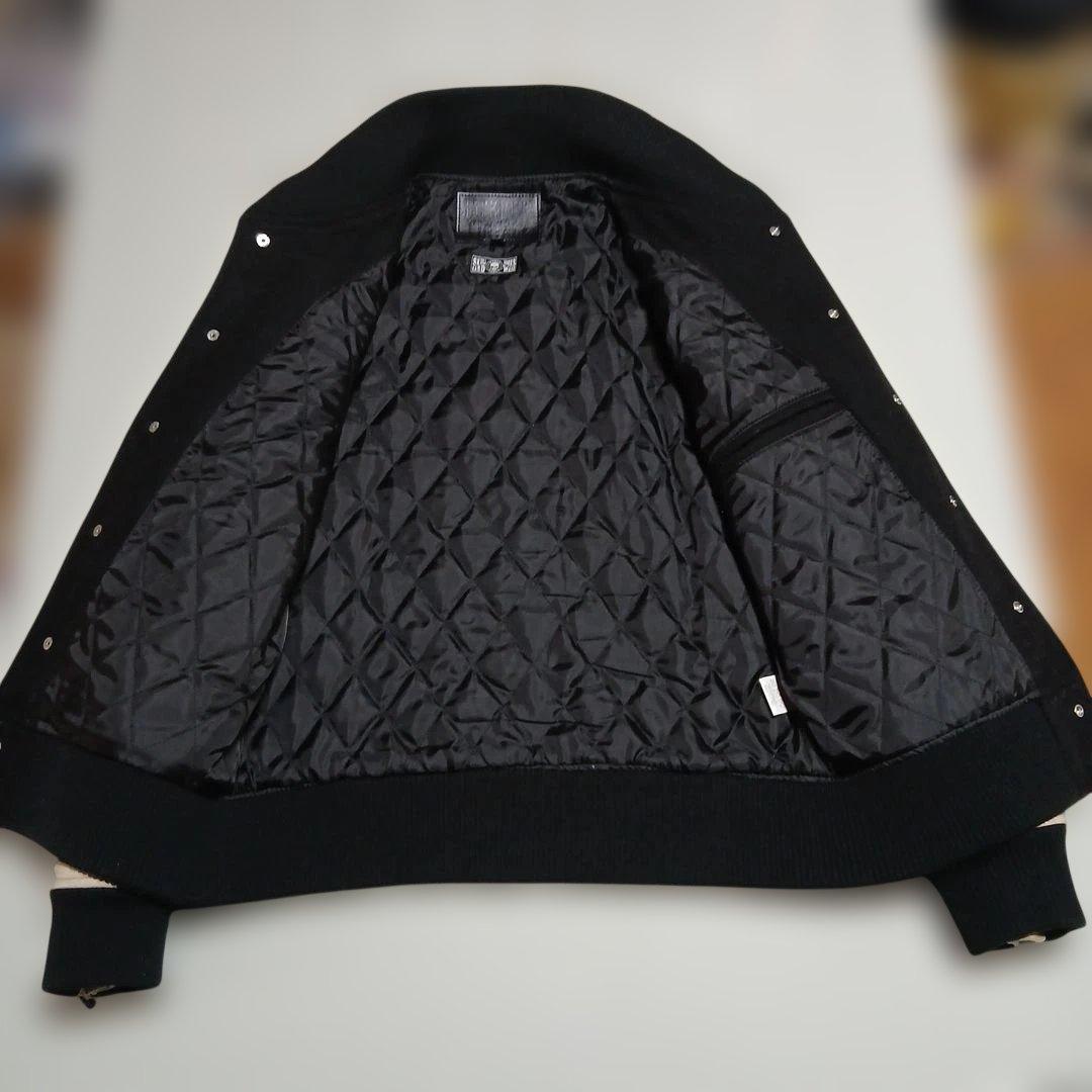 ブランドコラボウール混本革牛袖スタジャン黒ベージュボーンスカルサガラ刺繍新品同様