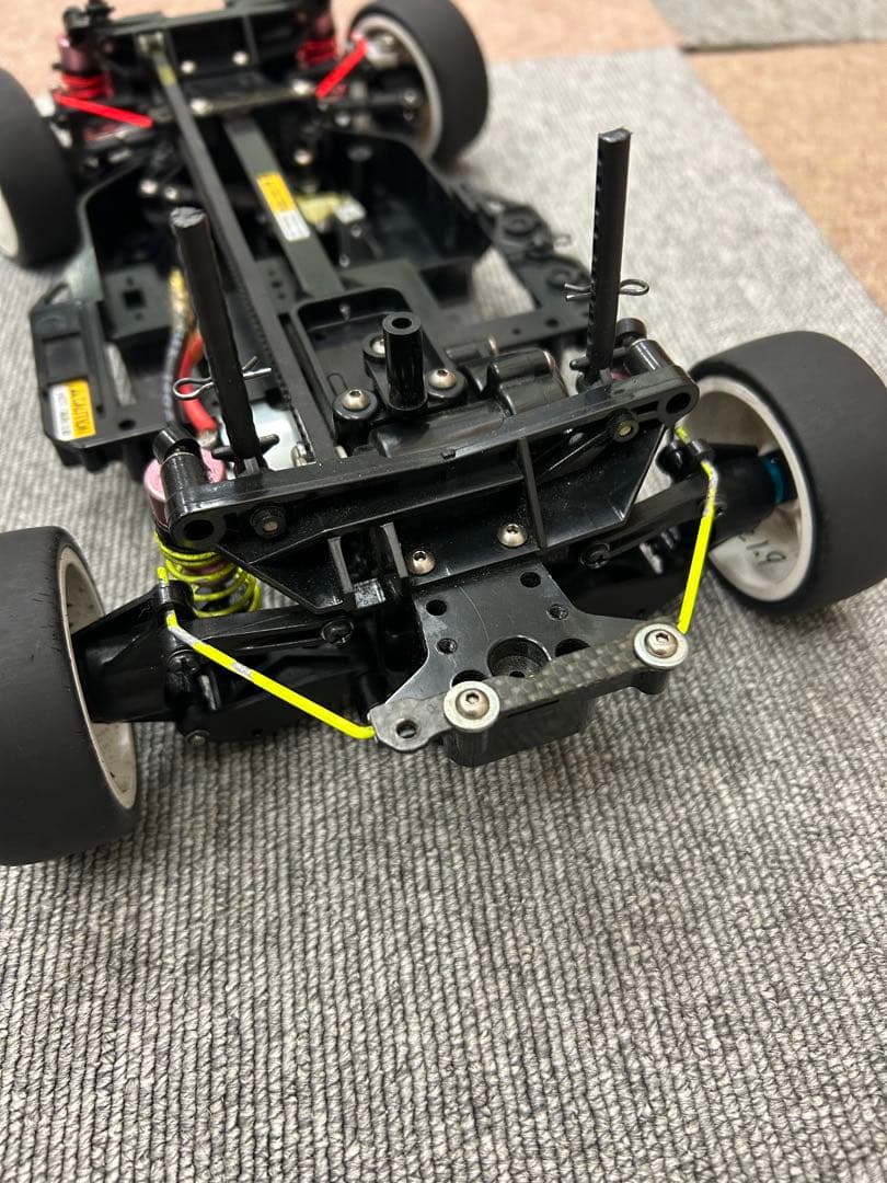 タミヤTA03RS中古シャーシ(オプション、ジャンクパーツ多数)